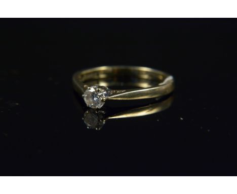 A 9ct gold diamond set solitaire ring, size N, weight approx 2g