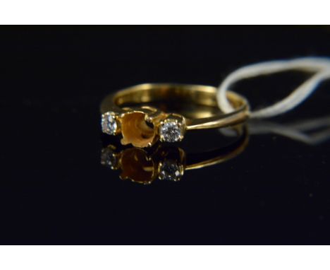 An unmarked yellow gold ring set with two brilliant cut diamonds, size M, weight approx 3.5g (centre stone is missing)