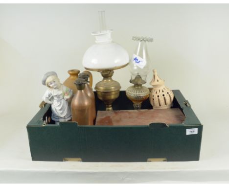 A mixed lot including two oil lamps, two vintage copper 'ICI' screw top flasks, a bisque figure plus a small leather case con