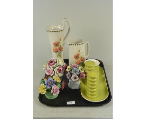 A Carlton ware cruet set plus three ceramic floral displays and two jugs