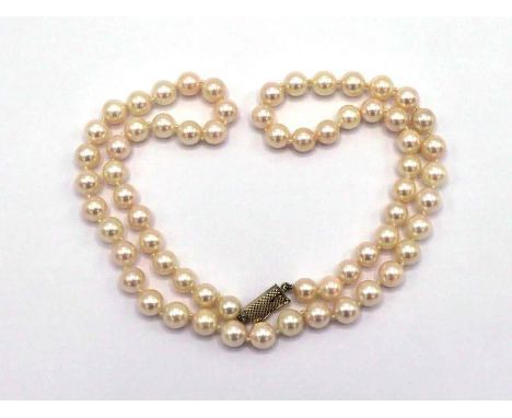 A cultured pearl necklace, composed of uniform 6mm spherical pearls, to a box snap clasp (tests 18 carat gold), 45cm long, to