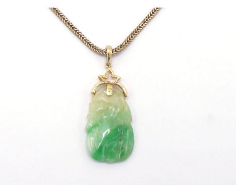 A carved jadeite pendant, the small pendant 2.5cm long, together with a yellow metal Byzantine link chain, the bolt ring clas
