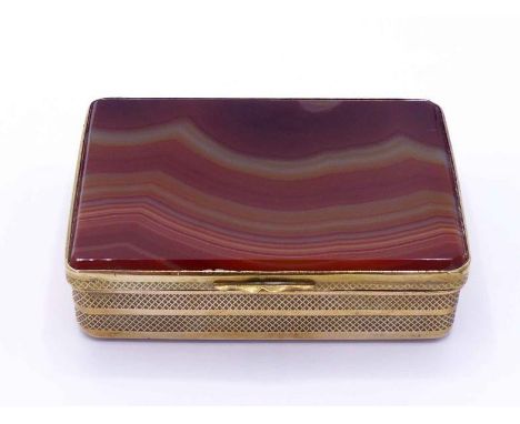 A gilt-metal snuff box with diaperwork sides and banded agate panel to cover and base, 19th century, 7.6 cm. long x 5.1 cm. w