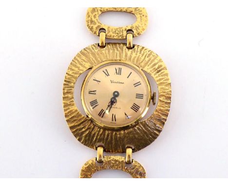 Vendome, a 1970s gilt metal dress watch, the circular gilt dial with black Roman numerals and Louis XV hands, with 7 jewel CO