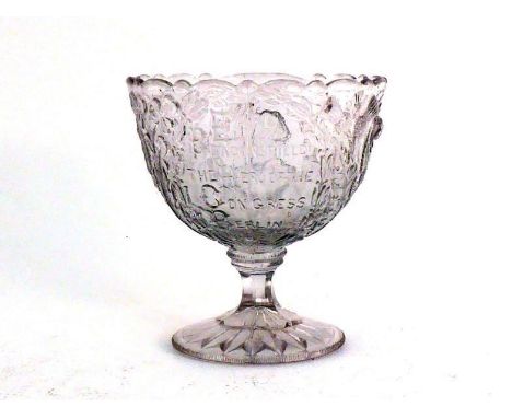 A pressed glass bowl with all the emblems of the United Kingdom hailing "Earl Beaconsfield, the Hero of the Congress, Berlin 