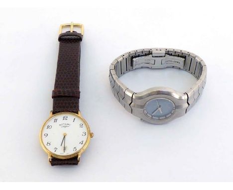 TAG HEUER, a stainless steel mid-size quartz wristwatch, with blue mother-of-pearl dial, silvered baton hands, and off set cr