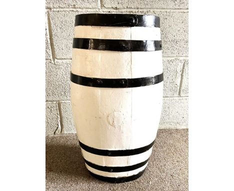 A white painted cask, with iron bands, re-purposed garden feature or planter