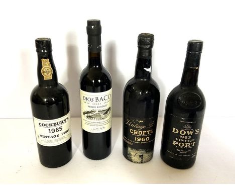 A small quantity of port, including a Cockburn’s Vintage Port, 1985 (1 bottle) ullage into neck; Dow’s vintage port 1983 (1 b