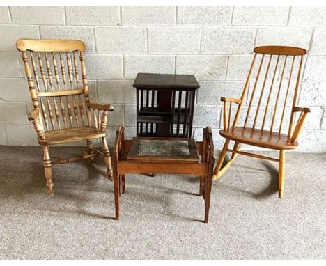 A group of furntiture, including a Windsor type turned ash wood rocking chair; a similare Ercol style rocking chair; a rotati