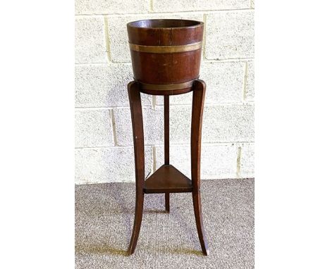 A vintage plant stand, with ring bound planter and tripod base; together with a clothes stand (2)