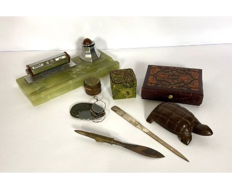 A group of assorted desk related items, including an agate based perpetual calendar and inkwell; a pair of folding glasses, a
