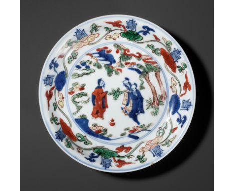 A WUCAI 'IMMORTALS' DISH, WANLI MARK AND PERIODChina, 1573-1619. Delicately potted with shallow rounded sides rising from a t