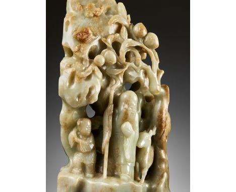 A LARGE 'SHOULAO GROTTO', DEEP CELADON AND RUSSET JADE, 18TH CENTURYChina. Superbly carved in reticulated openwork to depict 