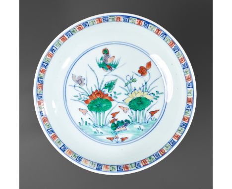 A DOUCAI 'LANCA AND LOTUS' DISH, YONGZHENG MARK AND PERIODChina, 1723-1735. The shallow rounded sides rising from a slightly 