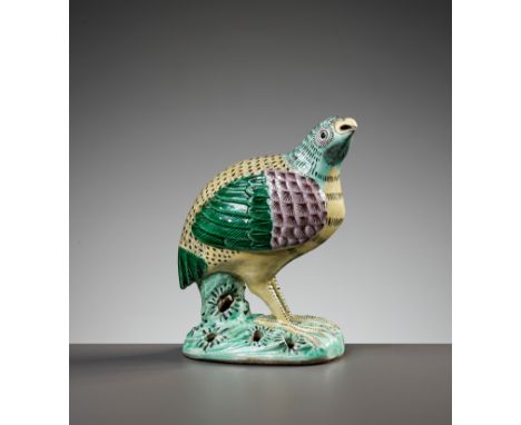 A FAMILLE VERTE FIGURE OF A QUAIL, DAOGUANG PERIODChina, 1822-1851. Well modeled as a quail perched on a pierced rockwork bas