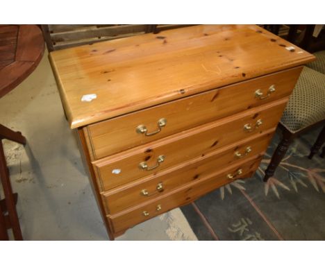 A vintage pine chest of four long drawers, having ply bases, width approx. 82cm