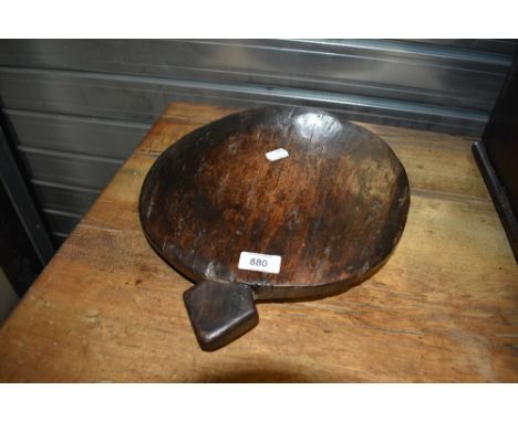 An Antique treen crock lid , repurposed as a chopping board or decorative item, very tactile