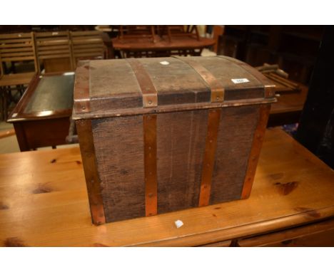 A small ply and copper bound trunk/casket having iron handles