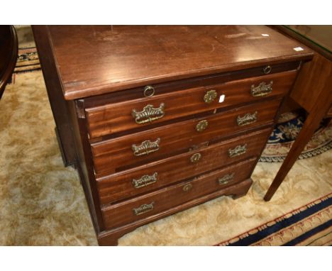 A 19th Century mahogany chest of drawers of small proportions, four drawers and brushing slide, with bracket feet, width appr