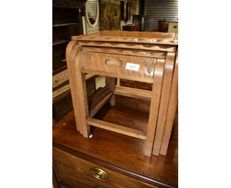 A vintage nest of three Oriental style tables, the smallest table having interesting integral drawer, max width approx. 38cm