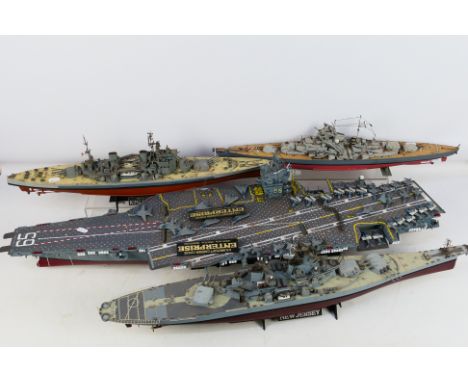 Tamiya - Four constructed 1:350 scale plastic model ship kits by Tamiya. Lot consists of Tamiya #7307 USS Enterprise CVN-65; 