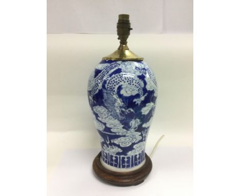 A blue and white fishbowl, approx diameter 36cm, plus a blue and white table lamp and a pair of Oriental vases (4). Shipping 