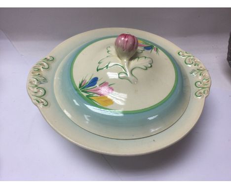 A Clarice cliff tureen decorated with flowers and foliage. NO RESERVE