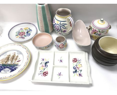 A collection of assorted items of poole pottery.