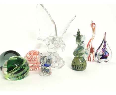 A collection of glass ornaments including an eagle figure and various paperweights including Langham, Caithness, Medina. Post