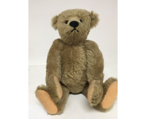 A mid 20th century Steiff bear hinged limbs with growler length 32cm