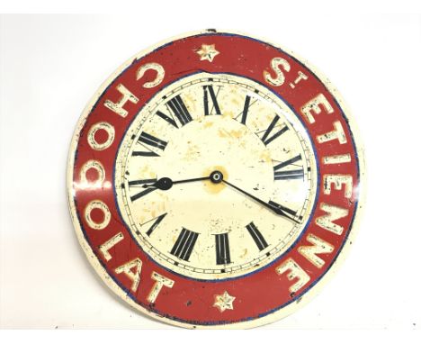 An enamel French St. Etienne Chocolat wall clock, diameter of 35cm. Postage category C