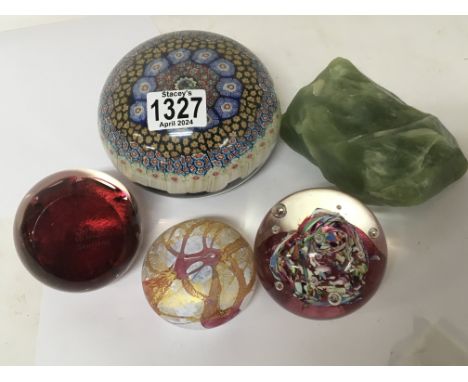 A large millefiori paperweight Caithness paperweights and uncut jade.