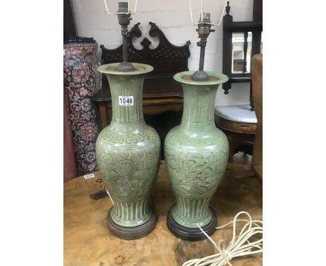 A pair of Chinese crackle glazed celadon vases converted to lamps, close match pair 49cm/51cm. (1 lamp with significant damag