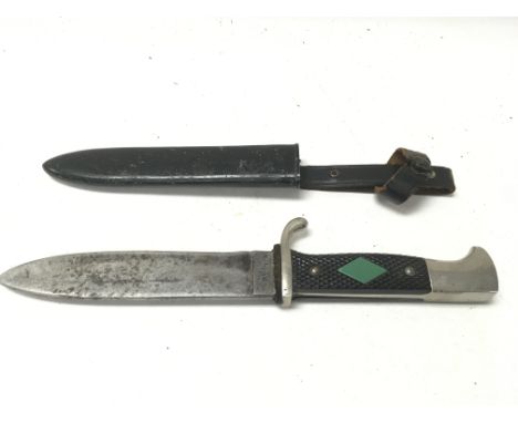 A hitler youth pattern knife with replacement enamel inset. Comes with metal and leather scabbard. Postage D