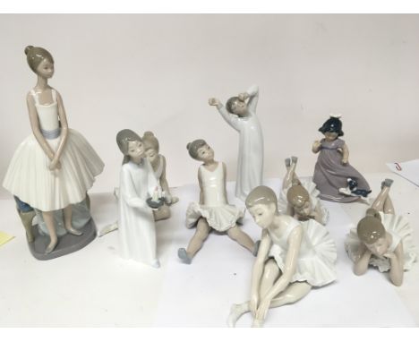 A collection of Nao ballerina figures and one Lladro figure a young girl holding a chamber stick all with no obvious damage. 