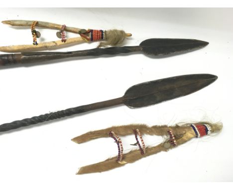 Two African Maasai spears for lion hunting. One is 170cm long and the other is 113cm long. Postage D