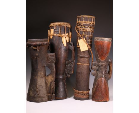 Coconut wooden hourglass shaped priest's drum, laber reads: Provenance Beloea. Provenance H.S.L. Blekkink, leeraar M.O.. Here