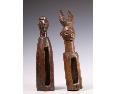 D.R. Congo, two Yaka slit drums, topped by anthropomorphic heads Provenance: The private collection of Musical instruments of