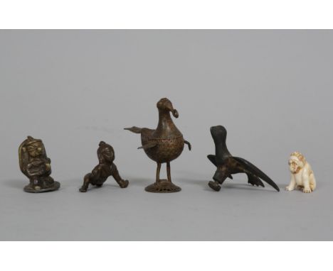 Four brass statues and a small Fo dog netsuke. The metal objects being two birds, ababy Krishna and a deity. [5] h. 3 - 8.5 c