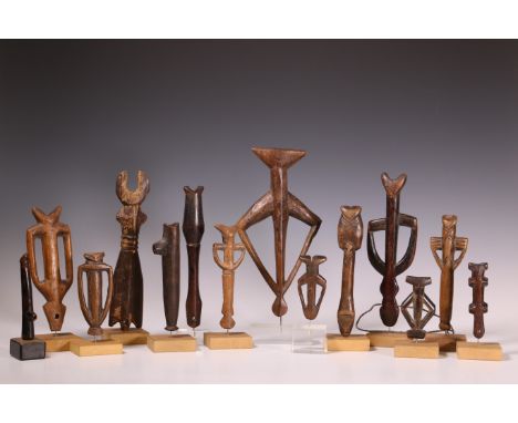Burkina Faso a collection of fourteen wooden flutes Provenance: The private collection of Musical instruments of Piet van Box