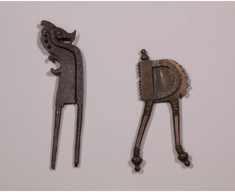 Java, iron betelnut cutter shaped as a horse. Herewith an Indian betel nut cutter. Provenance: The private collection of Musi