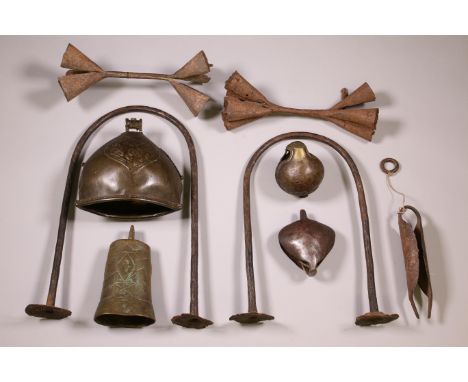 A collections of various African iron currencies and gongs and rattles. Provenance: The private collection of Musical instrum