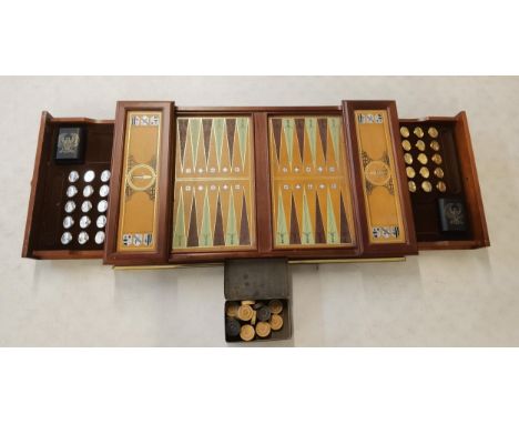 A 1986 Franklin Mint King Arthur and the Knights of the Round Table backgammon set with gold plated and silver plated counter