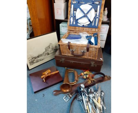 A mixed lot to include 2 picnic sets, a copper bugle, a vintage suitcase, belts, a print of The Royal Hotel in Slough during 