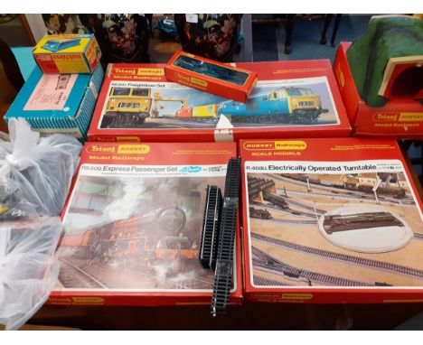 A model railway train collection comprising three boxed Tri-ang Hornby trains and accessories to include an RS609 Express Pas