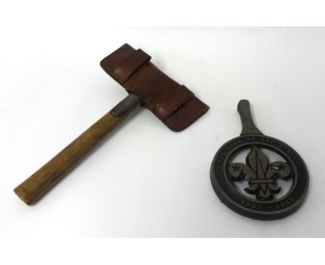 An engraved axe with steel head and ash handle leather case with belt loops and Scout badge (See 1912 Smith catalogue) also c