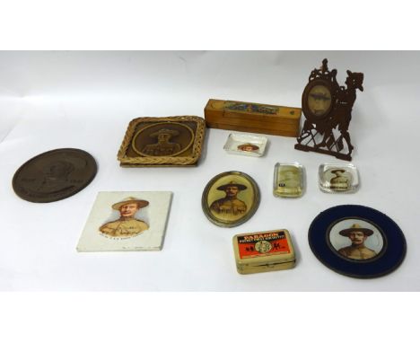 Mixed lot of twelve objects including plaster B-P plaque, Boy Scouts pencil case, paperweights, first aid outfit, B-P oval po
