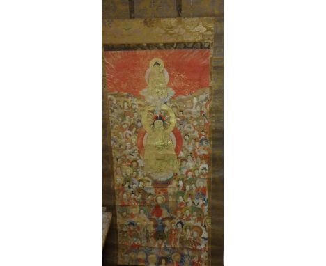 A large old Chinese scroll decorated with numerous figures