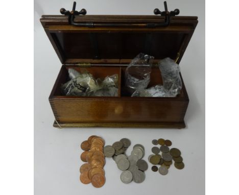 An old tie press box containing a large quantity of general coinage