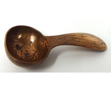 A Newlyn hammered copper caddy spoon, 8.5cm